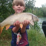 Young Wez bags carp on Victoria